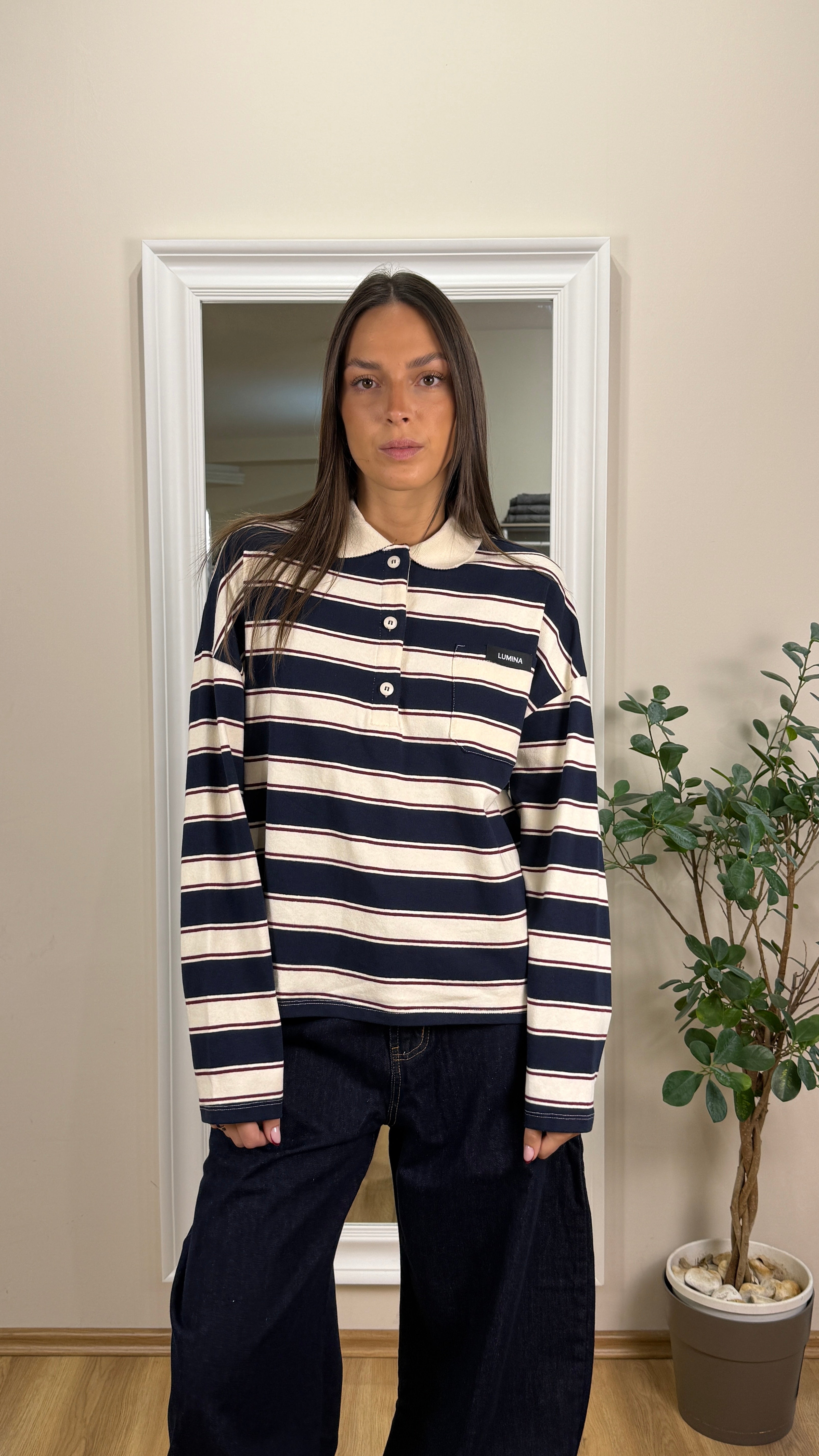 Lumina polo a righe.