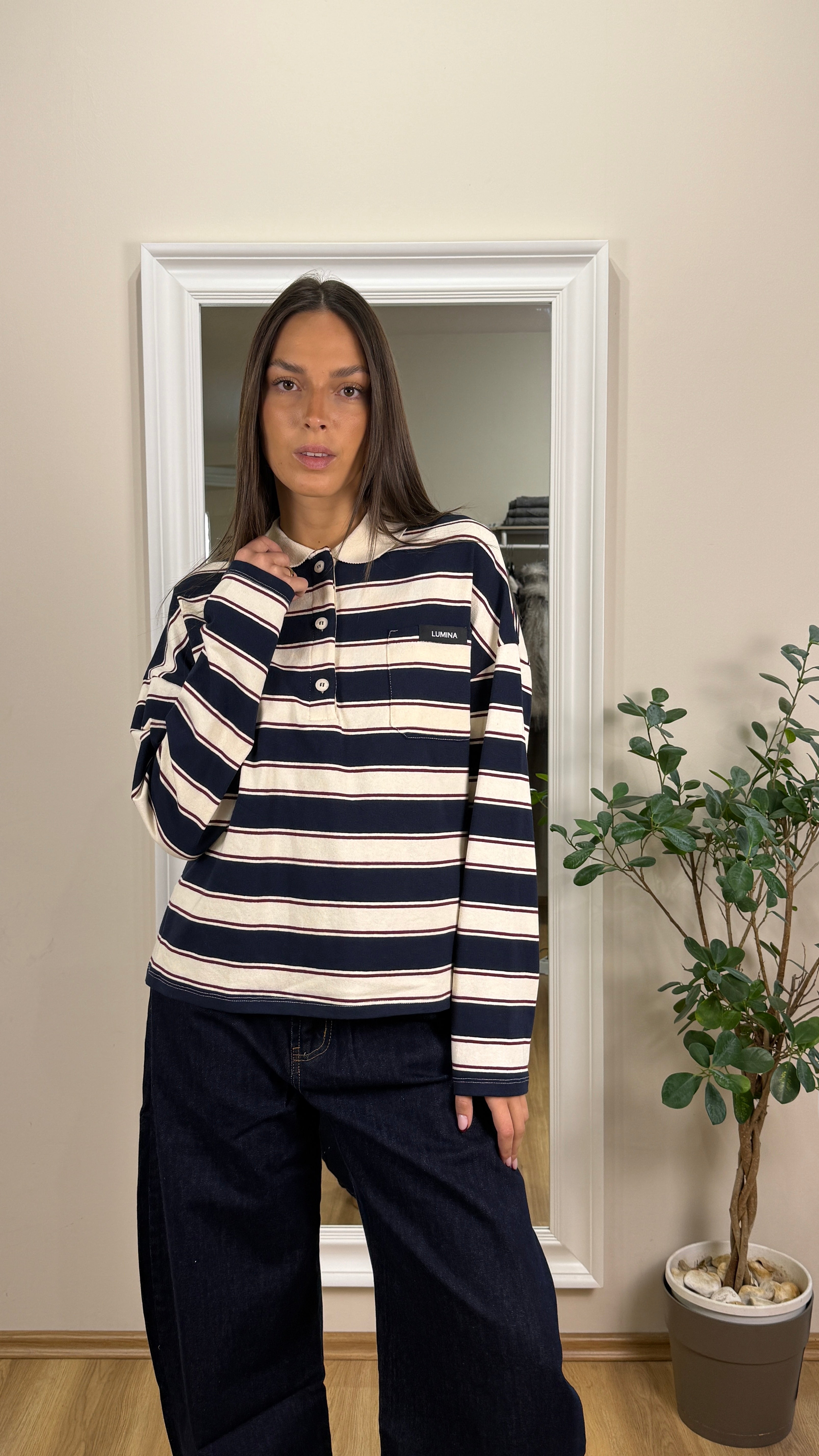 Lumina polo a righe.