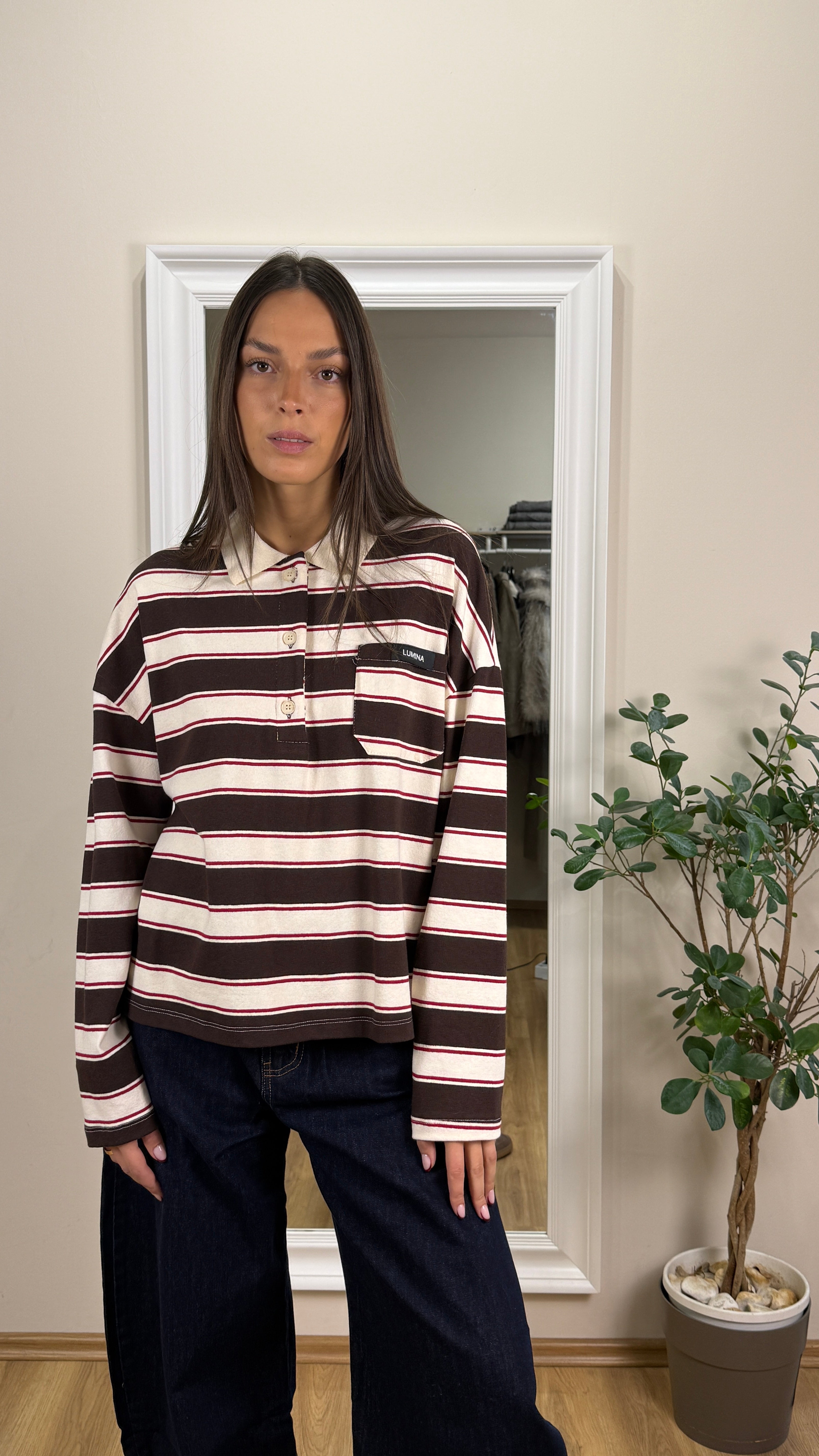 Lumina polo a righe.