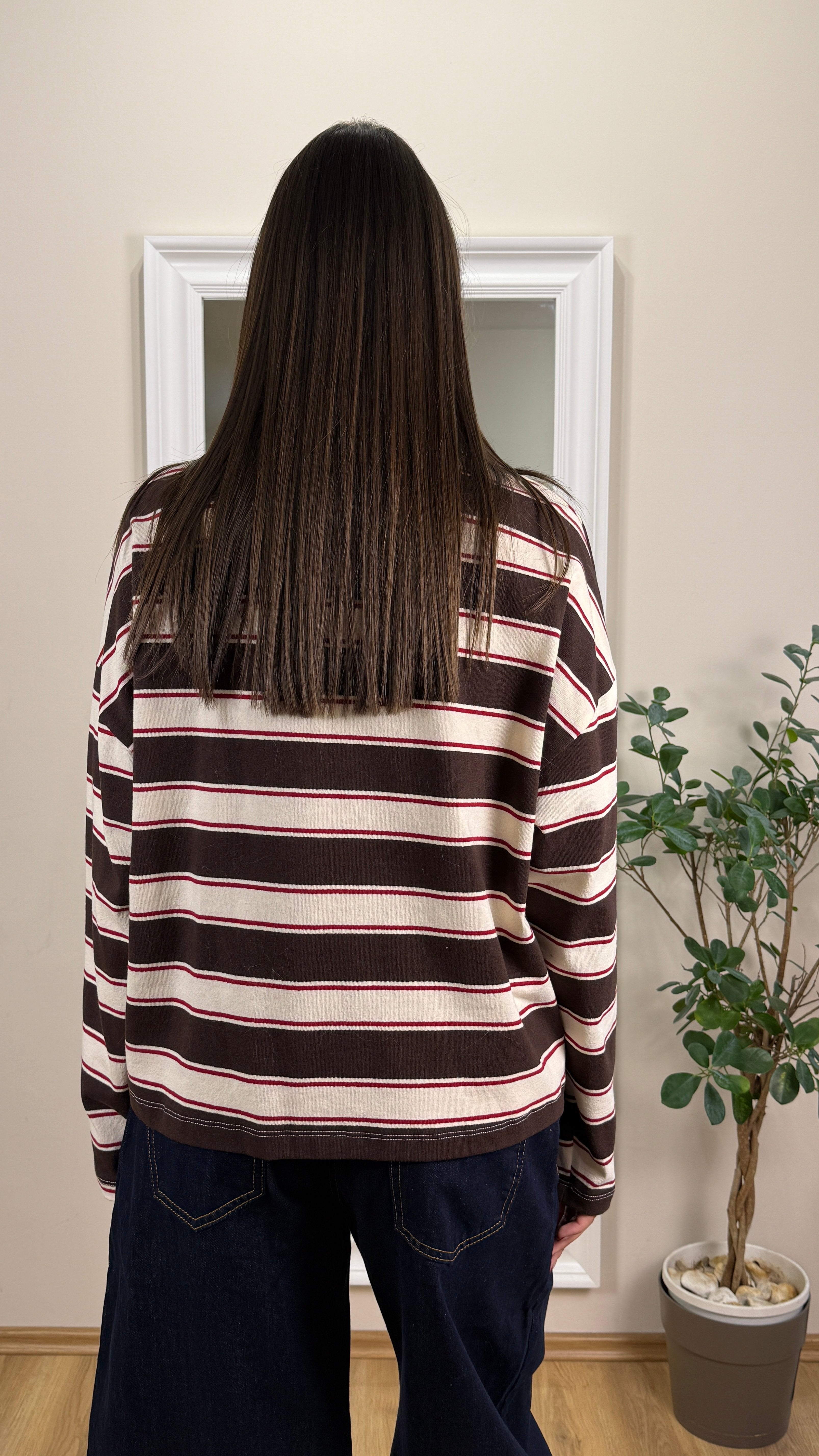 Lumina polo a righe.