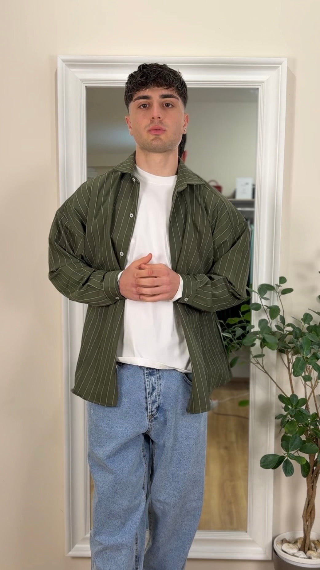 Camicia a righe verde modello over.