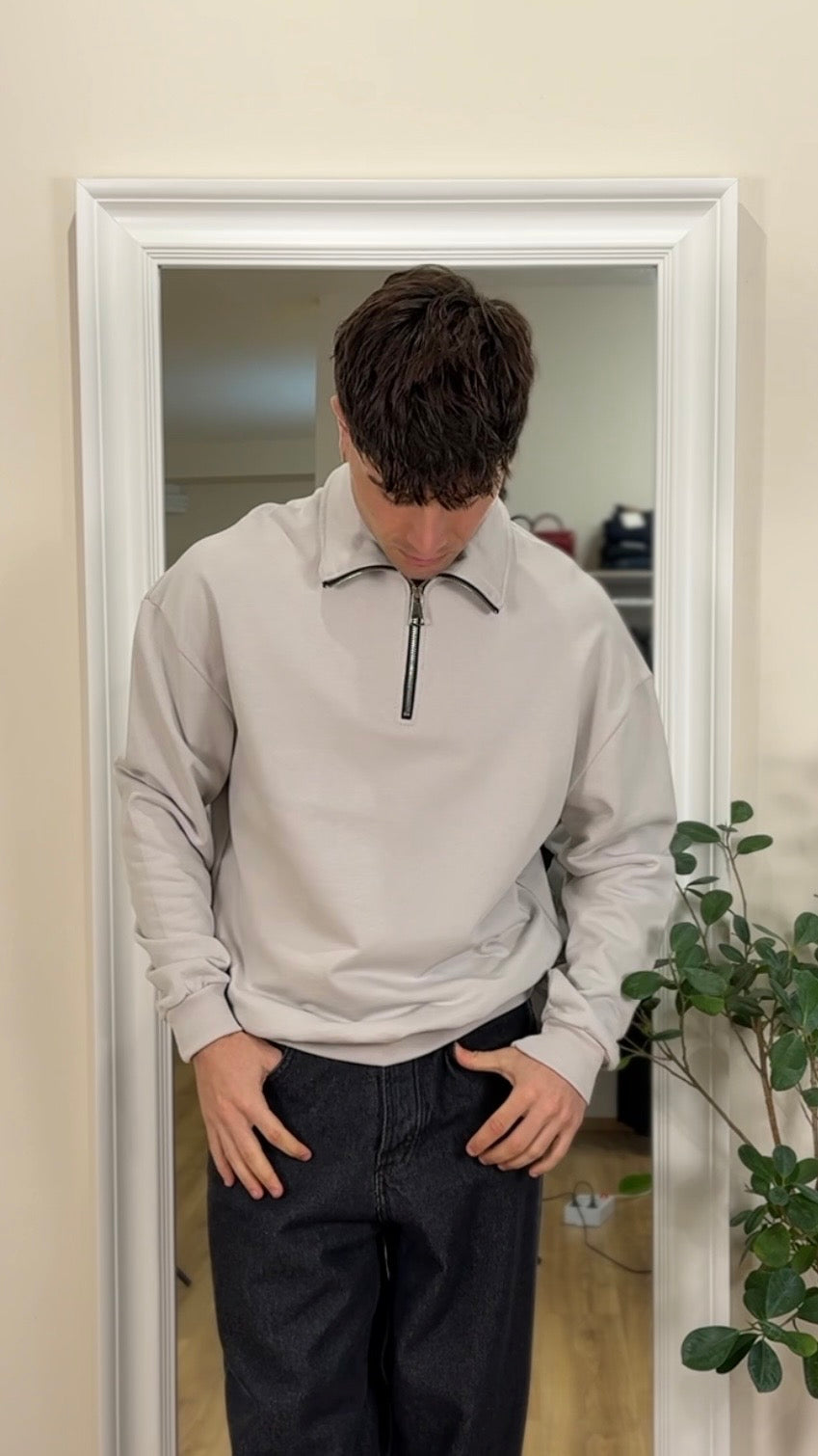 Felpa garzata con mezza zip color ghiaccio.