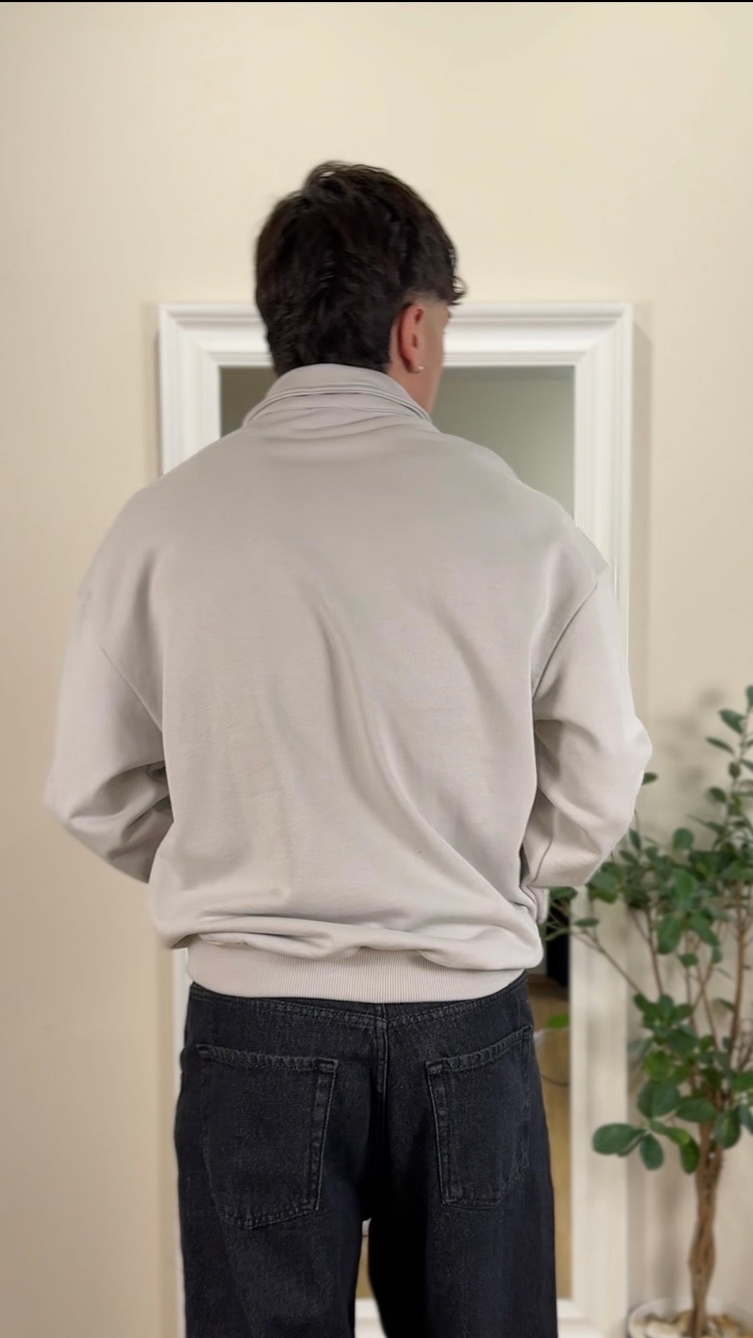 Felpa garzata con mezza zip color ghiaccio.